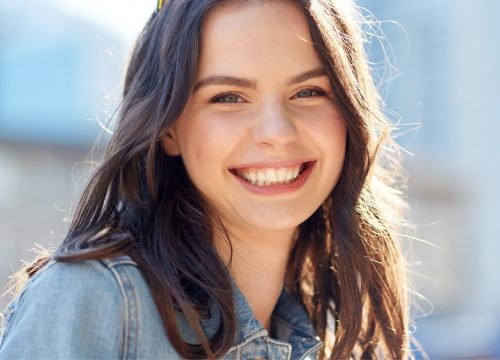 Woman with clear skin after acne scar treatments