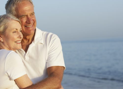 Older couple with high blood pressure at the beach