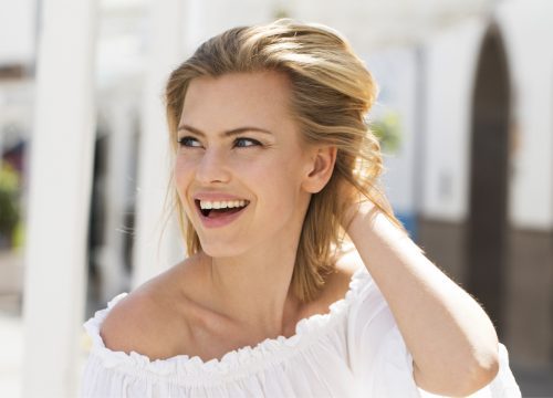 Woman with facial fullness after Juvéderm treatments