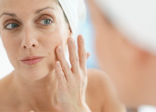 Woman suffering from skin laxity