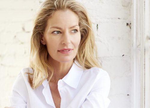 Older woman with wrinkles and fine lines